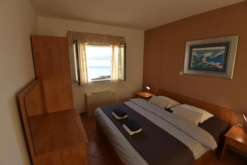 Postel nebo postele na pokoji v ubytování Apartment resort