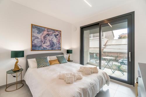 Urban Garden Lofts by Blue Velvet Livingsにあるベッド