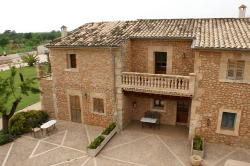 an aerial view of a building with a balcony at Agroturismo Es Quatre Cantons in Binissalem