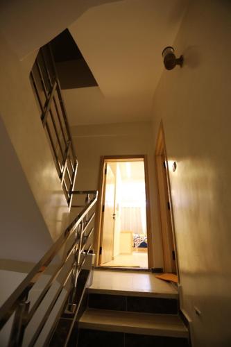 a staircase leading up to a room with a window at مولاي يعقوب in Fès