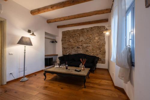 Coin salon dans l'établissement Dimoras Dimore nel cuore di Olbia
