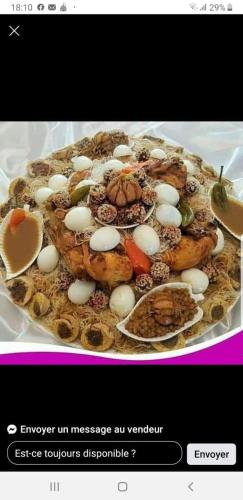 a plate of food with eggs and other foods at El Menzeh Foundation in Rissani