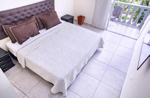 Hotel Posada Campestre San Gilにあるベッド