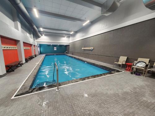 a large swimming pool in a large room at Mt Green, Pool, Gym, Sauna, Hot Tub Open 3br2b, in Killington