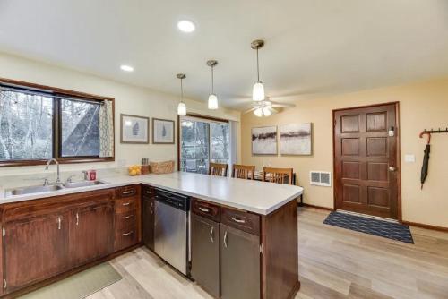a kitchen with a sink and a counter top at Fern Hill Retreat in Chehalis