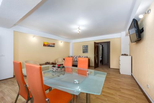 TV a/nebo společenská místnost v ubytování Central Apartament Predeal Nr 2