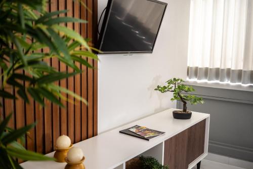 TV a/nebo společenská místnost v ubytování Hotel Corregidor by Cassana