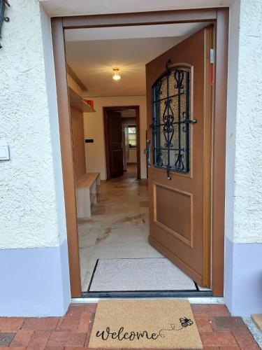 a door leading into a hallway of a house at AlpApart Hornberg in Hofen