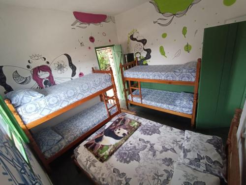 Postel nebo postele na pokoji v ubytování Sumé Hostel