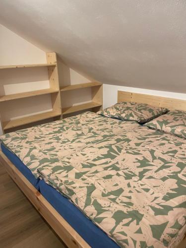 Postelja oz. postelje v sobi nastanitve Apartmán Putim