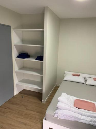 Postel nebo postele na pokoji v ubytování Appartement Ikebana - Maulévrier Cholet Puy du Fou