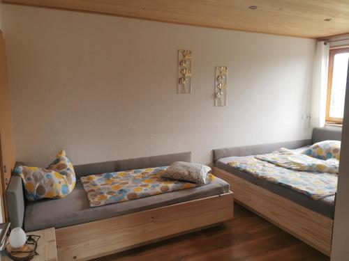 Postel nebo postele na pokoji v ubytování Bereuter