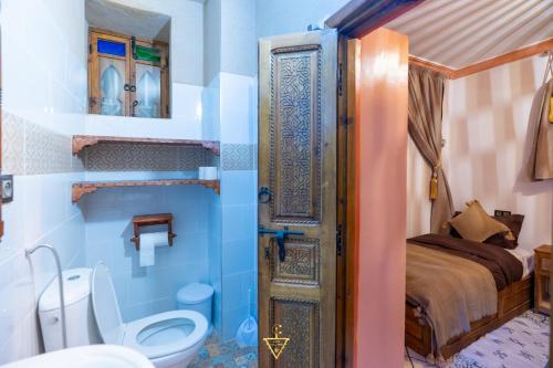 Koupelna v ubytování Riad Village