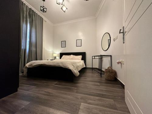 Postel nebo postele na pokoji v ubytování جناح غرفة وصاله حي النخيل ذاتي الدخول