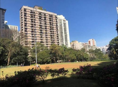 a large park with tall buildings in a city at Get a Flat 401 - Duplex Luxuoso in São Paulo