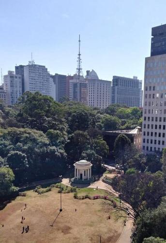 a park with a monument in the middle of a city at Get a Flat 401 - Duplex Luxuoso in São Paulo