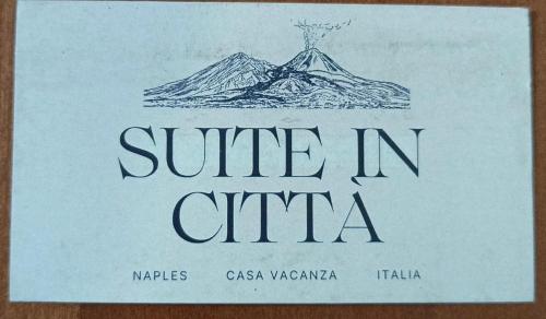 a sign that says cure in china with a mountain at Suite in città in Naples