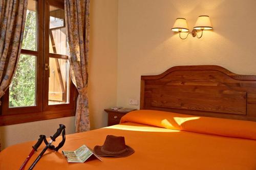 Una cama o camas en una habitación de Hotel Charle