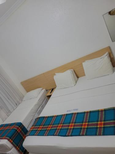 Dom Pedro Hotelにあるベッド