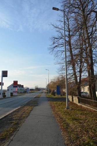 a street light on the side of a road at Apartment Ematours in Požega