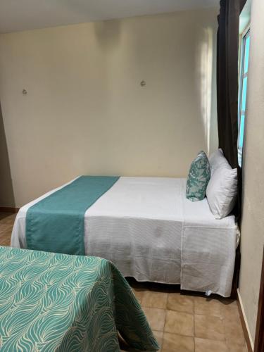 Ένα ή περισσότερα κρεβάτια σε δωμάτιο στο La Casita de Jonas