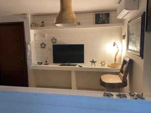 TV a/nebo společenská místnost v ubytování Trieste Sea Life