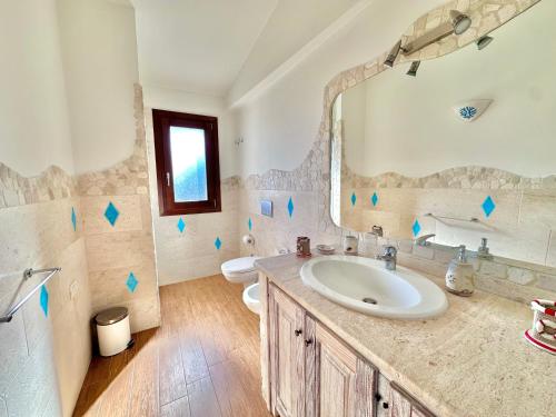 Ванная комната в Villa Ibiscus