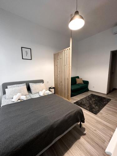 Llit o llits en una habitació de Dolce Vita Budapest