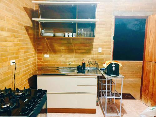 Η κουζίνα ή μικρή κουζίνα στο Eco Flat 322 - Hotel Fazenda Pedra do Rodeadouro