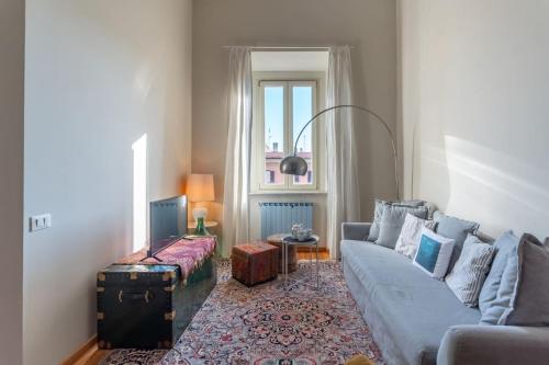 Pgrhome Luxury Apartments Principe Umberto tesisinde bir oturma alanı