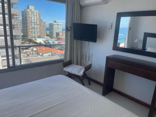 Ένα ή περισσότερα κρεβάτια σε δωμάτιο στο Apartamento en Santos Dumont