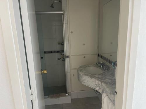 Ένα μπάνιο στο Apartamento en Santos Dumont