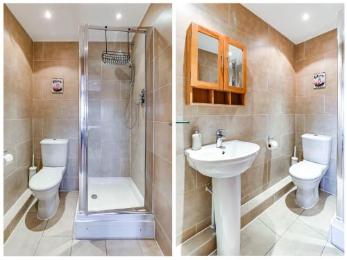 a bathroom with a toilet and a sink and a shower at Entire 2 Bed Flat Contractors Families and Relocators in Ware