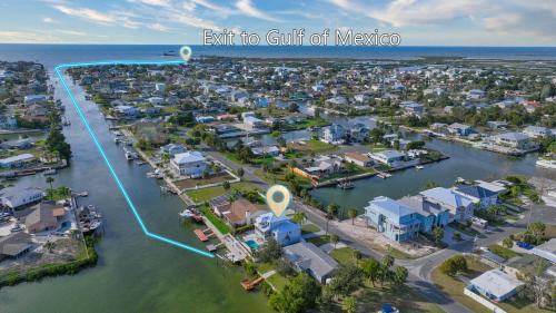 an aerial view of the city of mexico at 5 Bed3bath waterfront pool home with full gym, office, and heated pool! in Hernando Beach