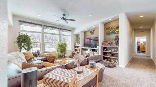a living room with a couch and a table at New! Grand Manor - Close to Tamarack and Lake Cascade - Pet friendly - fenced yard - trailer parking in Donnelly