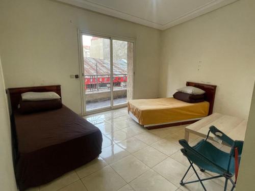 Un pat sau paturi într-o cameră la Casablanca Geusthouse