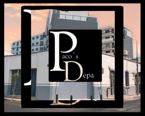a framed picture of the apgar sign in front of a building at "Paco's Depa" friendly & family apartment in Guadalajara