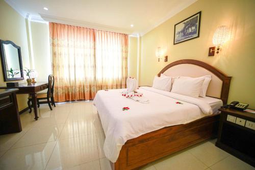 Postel nebo postele na pokoji v ubytování Classy Hotel & Spa