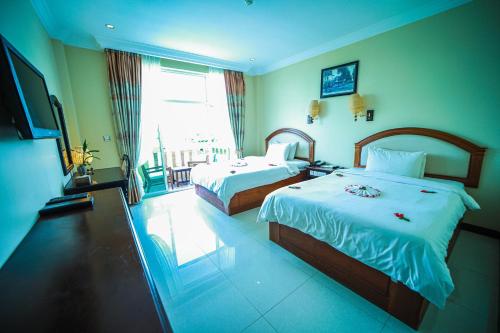 Postel nebo postele na pokoji v ubytování Classy Hotel & Spa