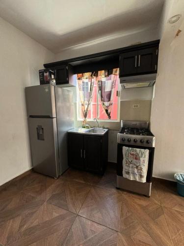 Una cocina o cocineta en Suites Apodaca