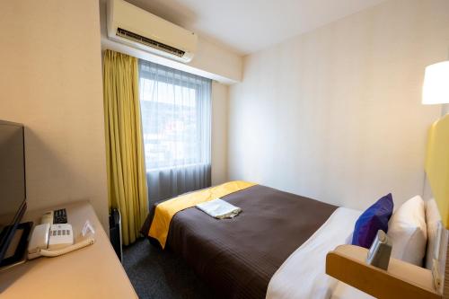 Cama o camas de una habitación en Hotel 1-2-3 Takasaki