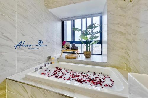a bathroom with a bath tub filled with red hearts at NEW! [Romantic Honeymoon] Imperio Studio Bathtub/4 pax/Game/MelakaRaya in Melaka