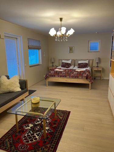 Ένα ή περισσότερα κρεβάτια σε δωμάτιο στο Villa Ranta