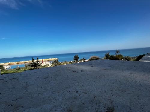 a view of the ocean from the beach at Dar Yessine Boutique Hôtel in Sousse