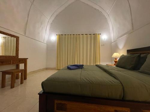 Ένα ή περισσότερα κρεβάτια σε δωμάτιο στο Rumah Tiga Gili #Lumbung