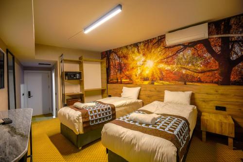Ένα ή περισσότερα κρεβάτια σε δωμάτιο στο Lupo Libero Hotel Spa