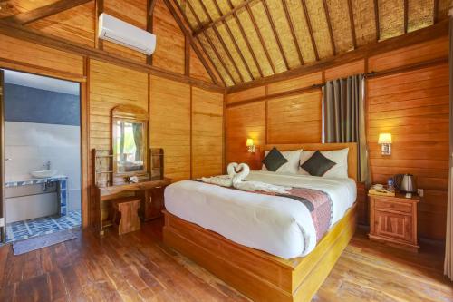 Katil atau katil-katil dalam bilik di SS Pangket Bungalow