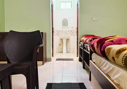Una cama o camas en una habitación de Hotel Samarth Residency