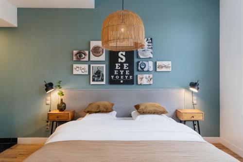 Postel nebo postele na pokoji v ubytování Eye Hotel