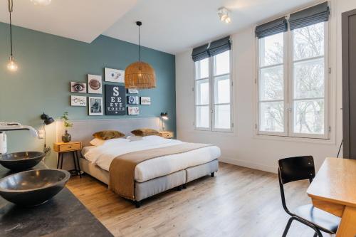 Postel nebo postele na pokoji v ubytování Eye Hotel